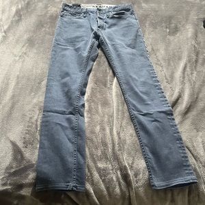 Selling tapered jeans 32 waist and 28 3/4 length